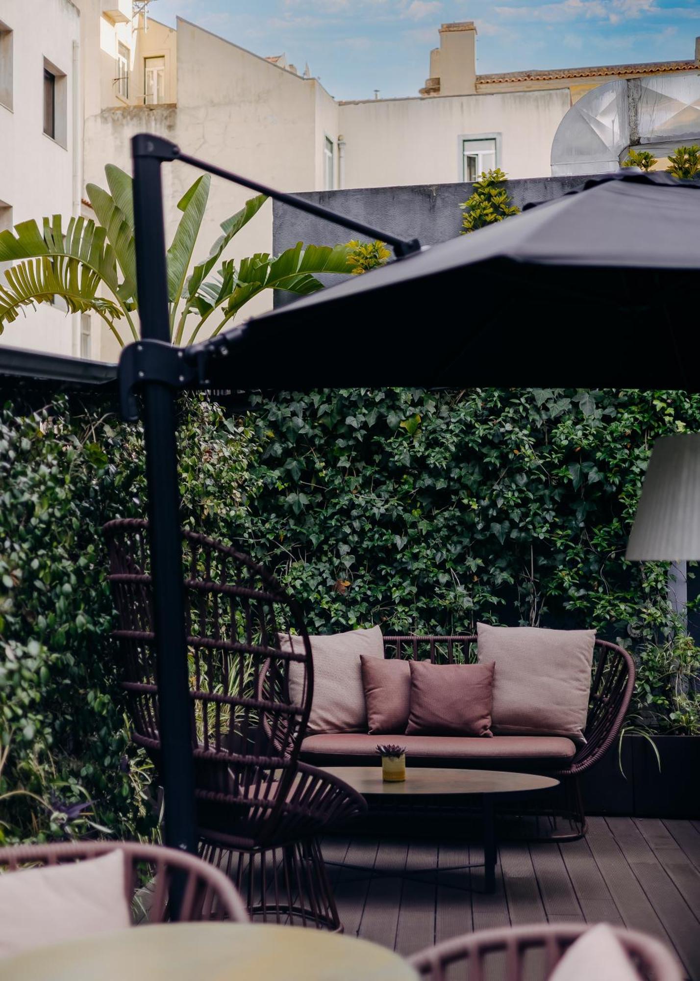 138 Liberdade Hotel Lisboa Εξωτερικό φωτογραφία The garden of the hotel